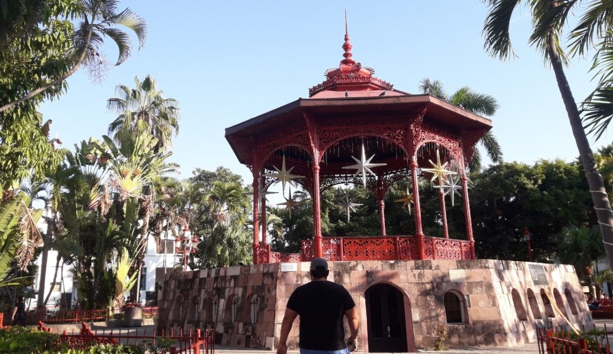 Plazuela República in Mazatlán, Sinaloa, featuring a red gazebo surrounded by palm trees 