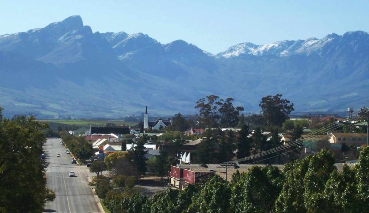 15 Small Towns in South Africa Travelers Should Visit Now 12 View of Tulbagh town with snow-capped mountains in the background, Western Cape, South Africa