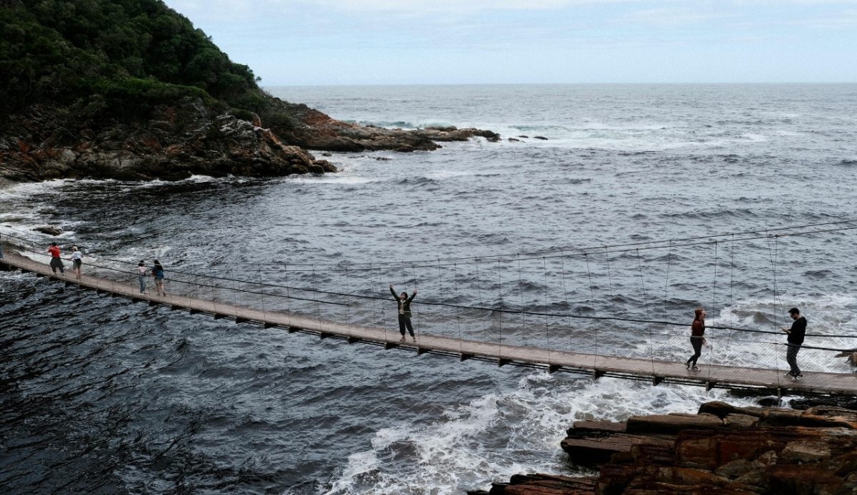 15 Small Towns in South Africa Travelers Should Visit Now 13 Suspension bridge over the ocean at Storms River Mouth, Garden Route National Park, South Africa