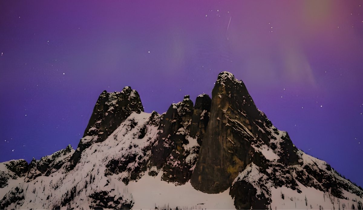 Aurora Borealis over Mount Katahdin, Maine night sky 