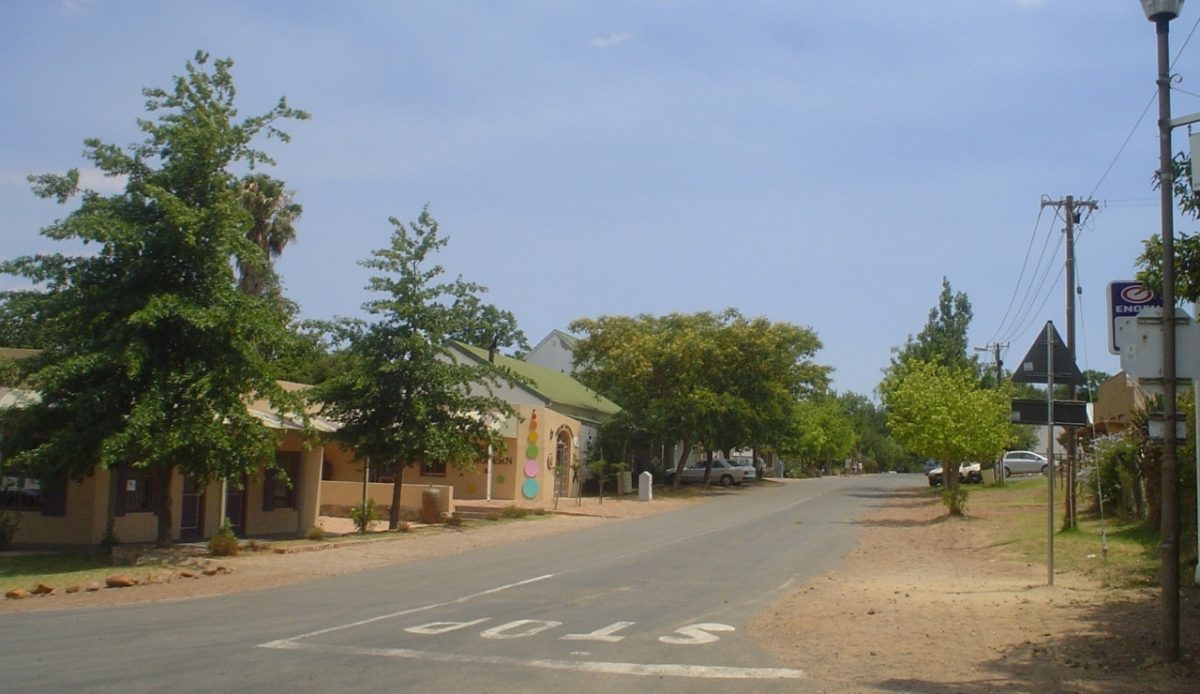 15 Small Towns in South Africa Travelers Should Visit Now 15 Main street of Greyton town with trees and buildings, Western Cape, South Africa