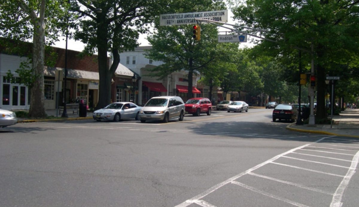 Downtown Haddonfield, New Jersey with cars and tree-lined streets 