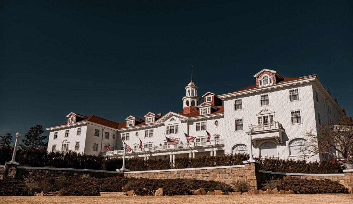 Historic Stanley Hotel with white exterior and red roof, Estes Park, Colorado, USA