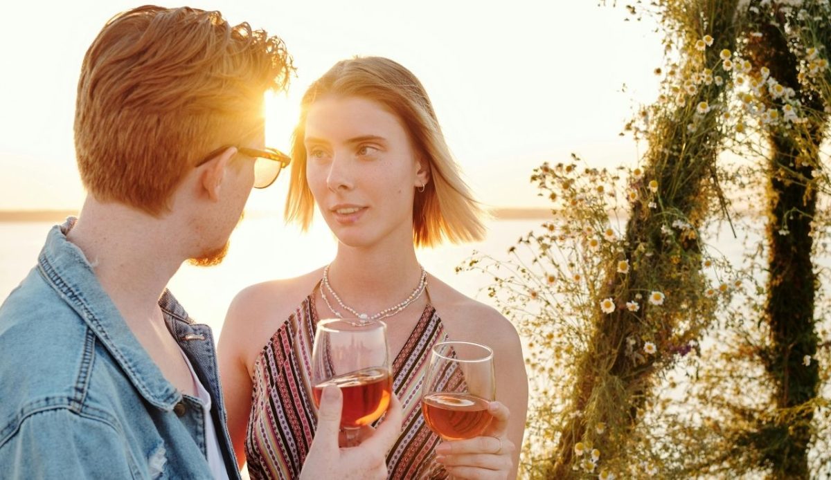12 Romantic Things for Couples to Do in Nashville TN 9 A Couple Looking at Each Other while Holding a Glass of Wine