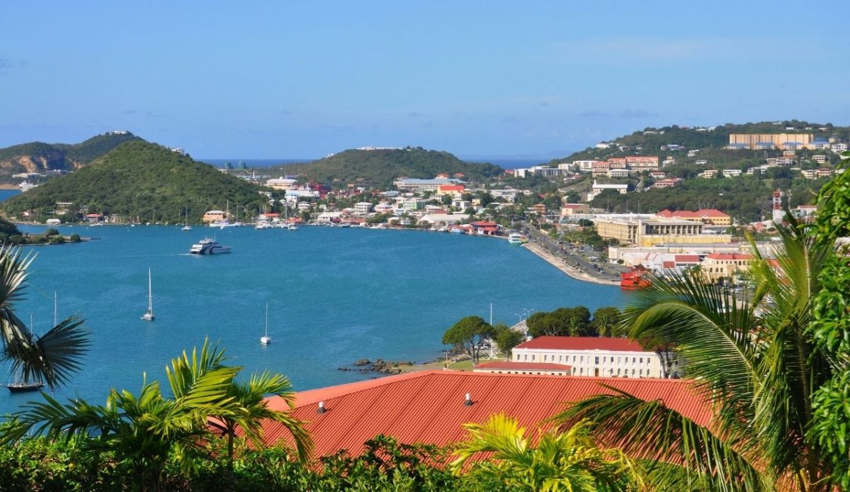 Top Things To Do in St. Thomas, US Virgin Islands 3 A scenic view of Charlotte Amalie Harbor, St. Thomas, Virgin Islands with historic buildings on a tropical hillside, USA