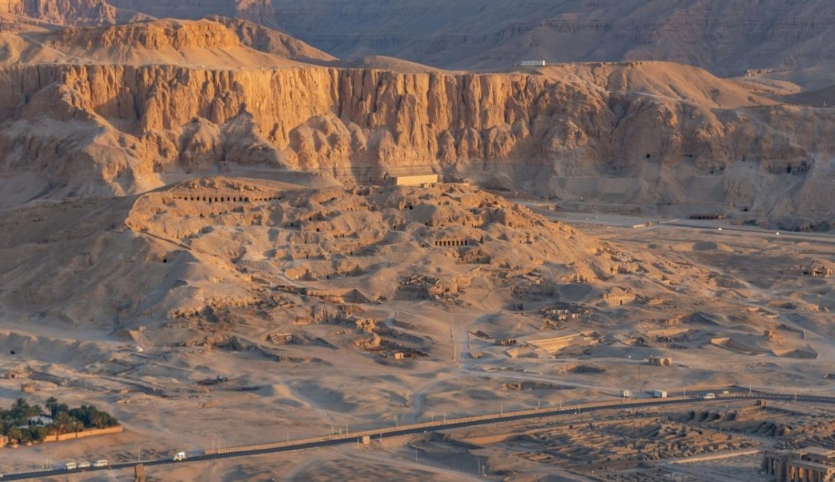 Aerial view of the Valley of the Kings in Luxor, Egypt, with tomb entrances and desert cliffs