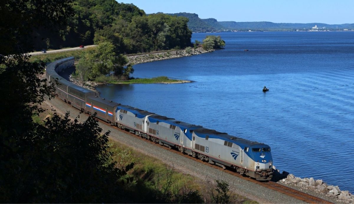 10 Scenic US Train Rides That Bring Back the Golden Age of Travel 3 Amtrak’s Empire Builder passing along the Mississippi River near Maple Springs, Minnesota, United States