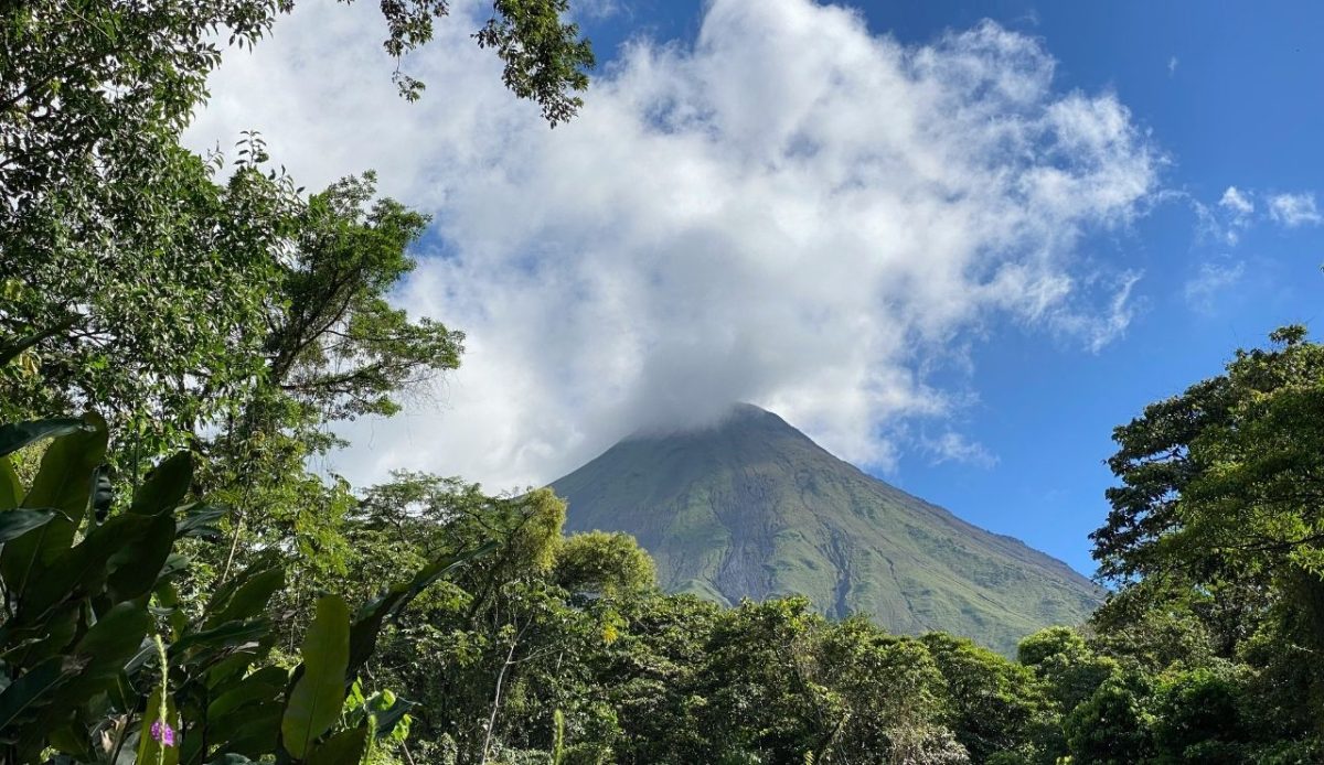 14 Best Airbnb Experiences Around the World Worth Trying 1 Arenal Volcano partially covered by clouds in Arenal Volcano National Park, Costa Rica