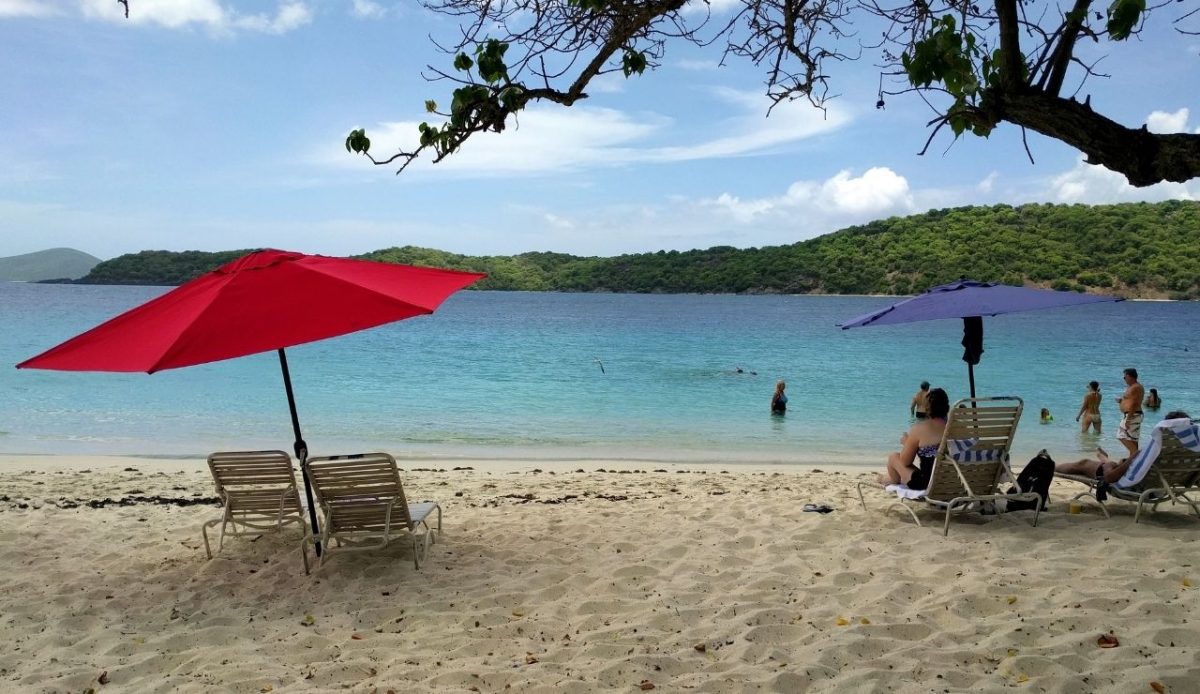 Top Things To Do in St. Thomas, US Virgin Islands 4 Beach chairs and umbrellas on Coki Beach, St. Thomas, U.S. Virgin Islands