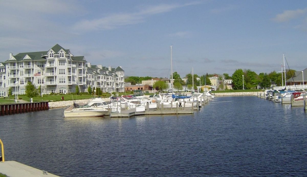 Michigan’s Gold Coast Beaches and Orchards Make the Perfect Road Trip 5 Boats docked at the marina in Ludington harbor, Michigan
