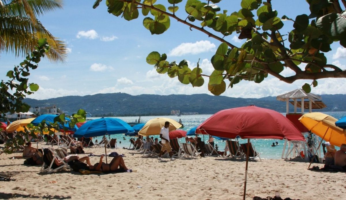 Colorful umbrellas at Doctor’s Cave Beach in Montego Bay, Jamaica