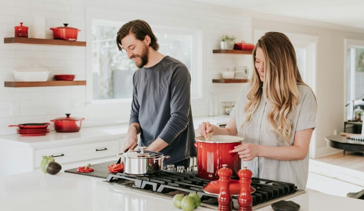 12 Romantic Things for Couples to Do in Nashville TN 11 Couple cooking together in a bright modern kitchen
