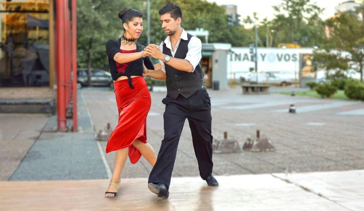 14 Best Airbnb Experiences Around the World Worth Trying 8 Couple performing an Argentine tango dance in a public square in Buenos Aires