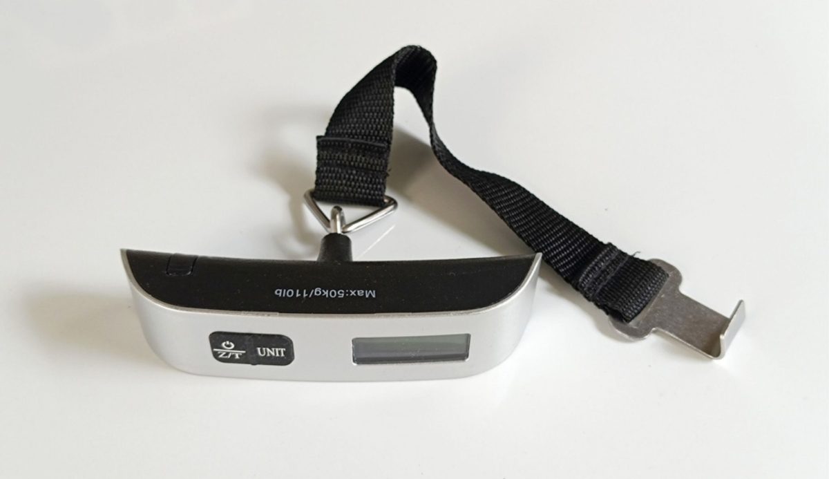10 Must-Have Essentials for Your Next Cruise 2 Digital luggage scale with strap and metal hook on white background
