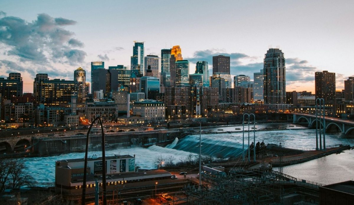 Downtown Minneapolis skyline at dusk overlooking the Mississippi River and St. Anthony Falls, Minnesota
