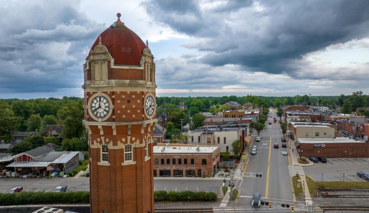 Small Michigan Town Near Ann Arbor Offers Dining, Shopping and Outdoor Fun 1 Drone photo of Downtown Chelsea, Michigan with the clocktower in the foreground
