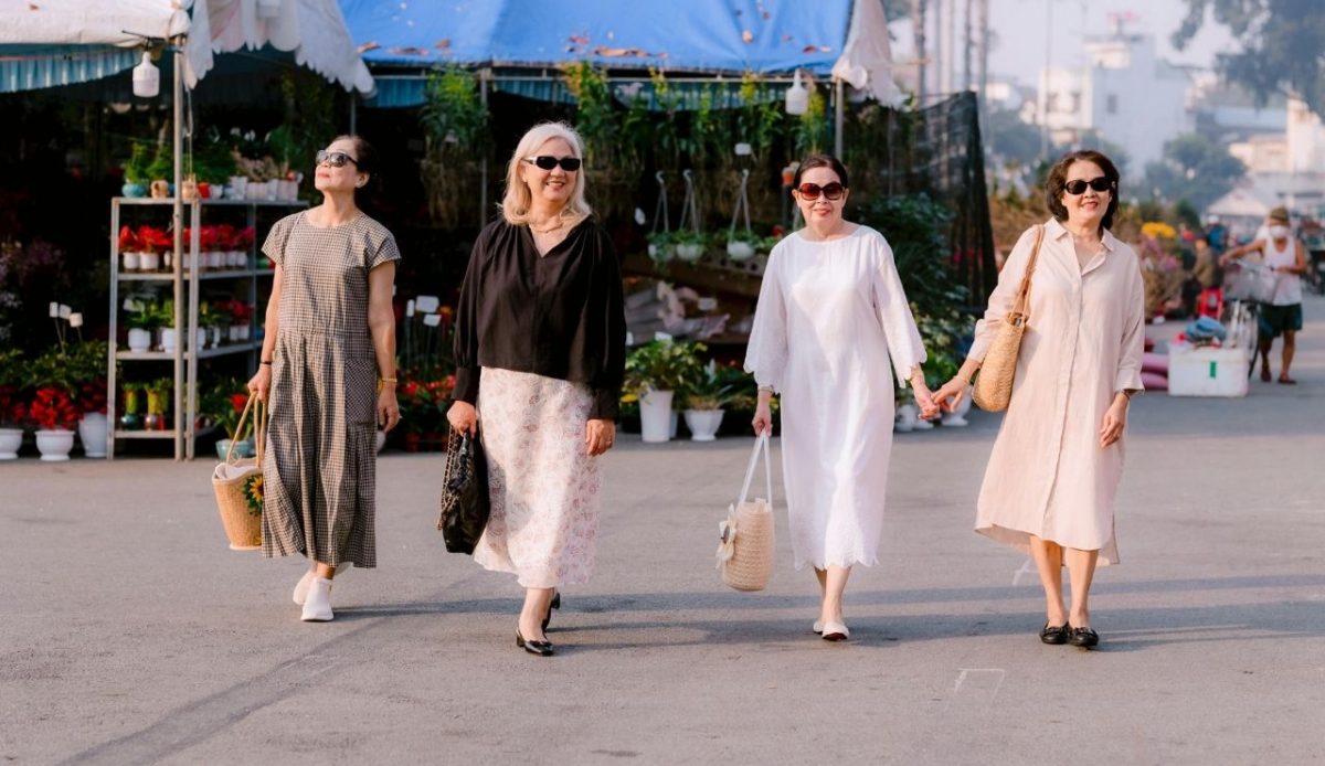 Elegant Women Shopping at Outdoor Market