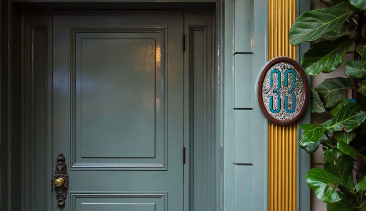 8 Disney Experiences Only the Wealthiest Can Afford 2 Entrance door of 33 club