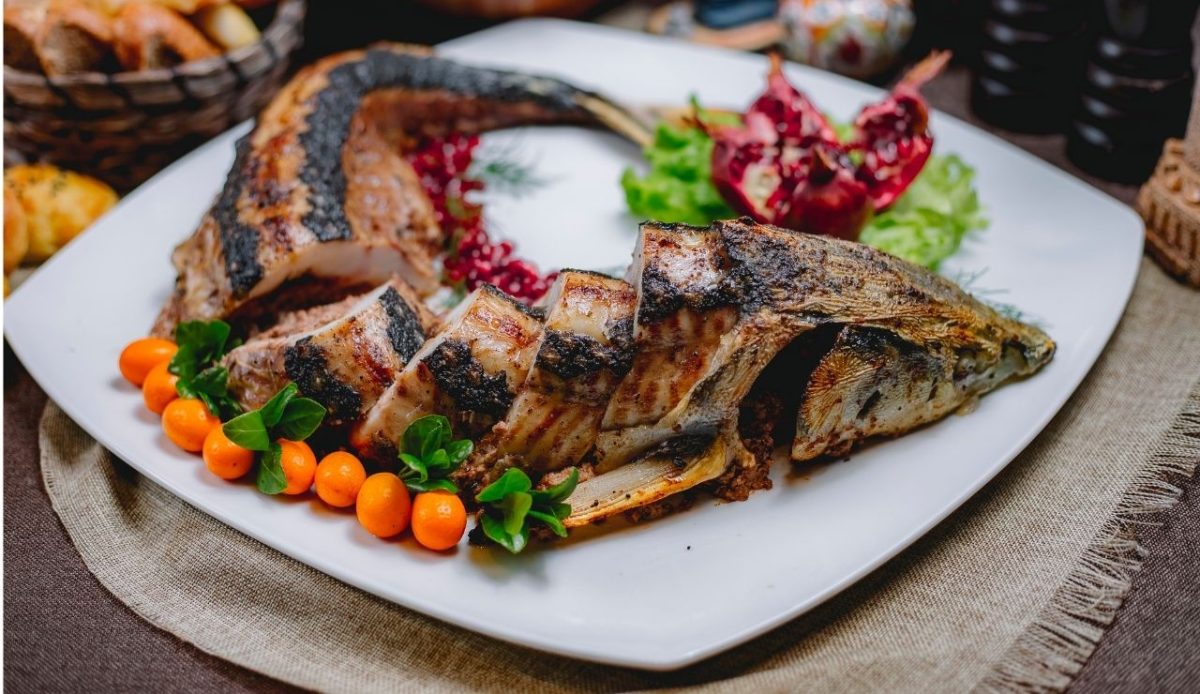 Inside the Famous Hula Hula Party in Hvar, Croatia 7 Fish grilled lavangy with walnut onions butter cherries raisin side view