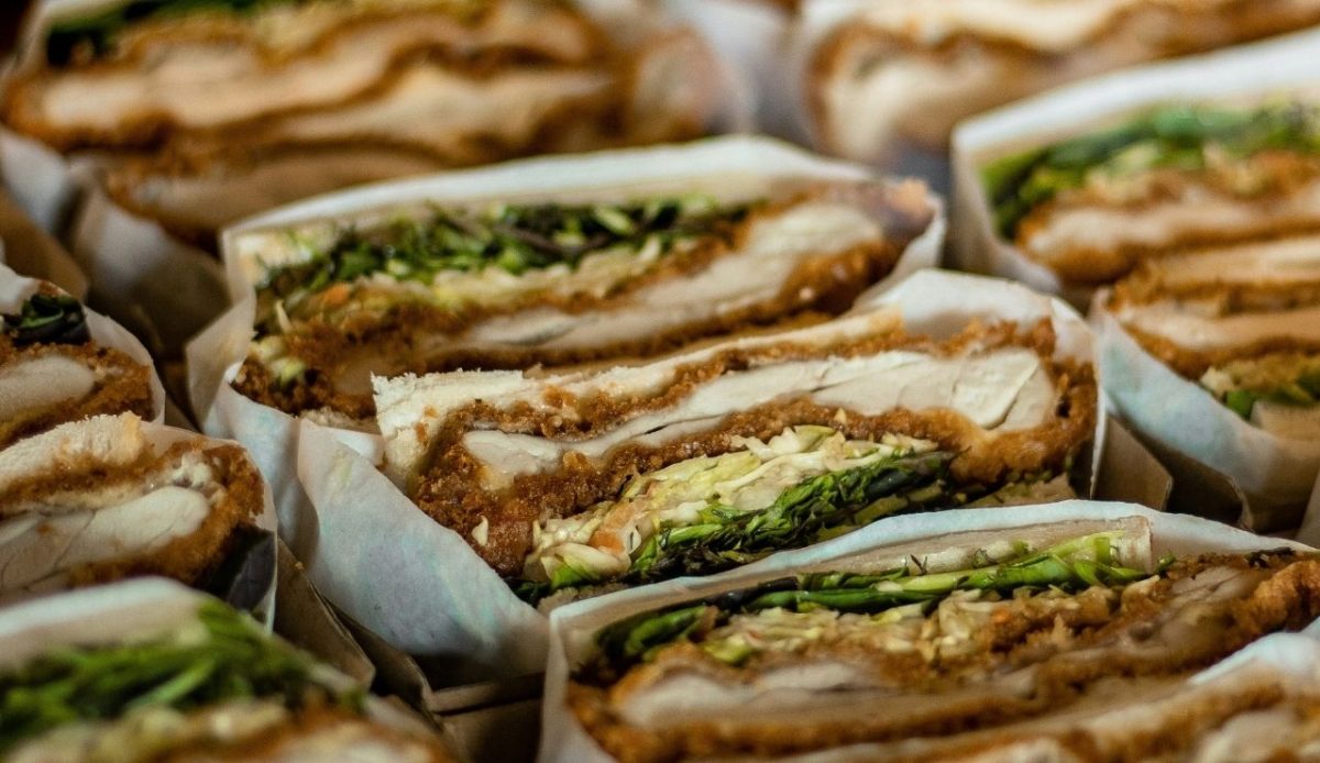 8 Airport Foods Every Traveler Should Avoid and Why 7 Fried chicken sandwich wrapped in paper