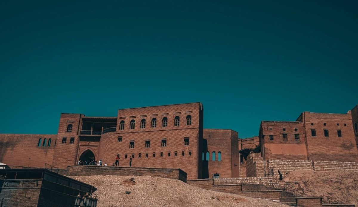 Historic Citadel of Erbil under clear blue sky, Erbil, Iraq