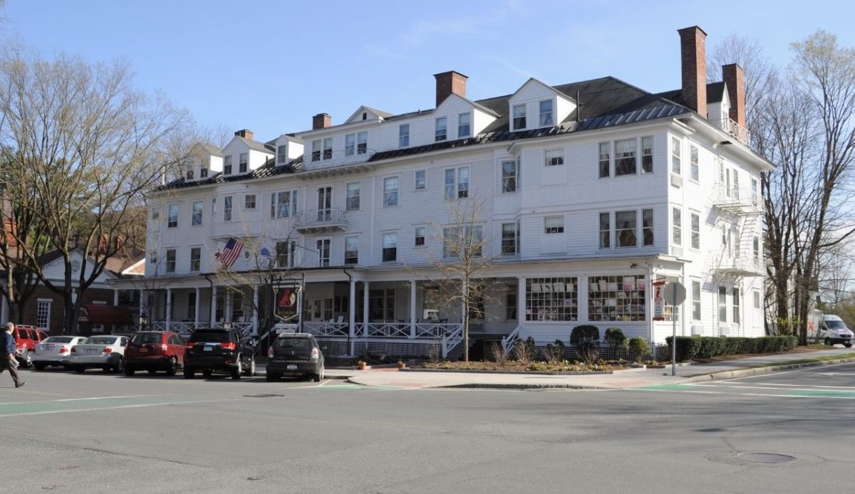 13 Haunted Places in the US Where You Can Spend the Night 4 Historic Red Lion Inn with white exterior and porch, Stockbridge, Massachusetts, USA