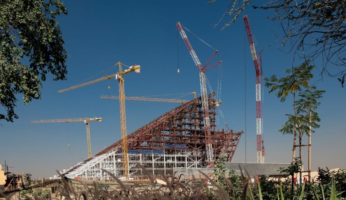 Inside the Abandoned Disney Resort With a Complicated Past 4 Large construction site with cranes building a steel-framed structure