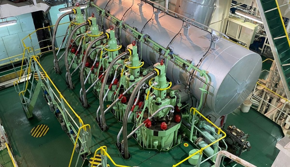The Viking Sky Cruise Disaster That Left 1,000 Passengers Stranded at Sea 2 Large marine diesel engine room with green machinery and yellow safety rails