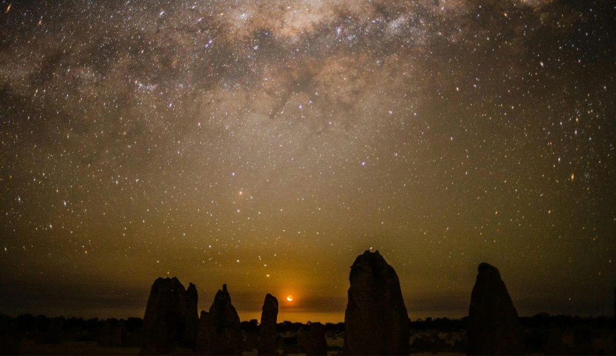 14 Best Airbnb Experiences Around the World Worth Trying 11 Milky Way visible over the Pinnacles Desert in Nambung National Park, Western Australia