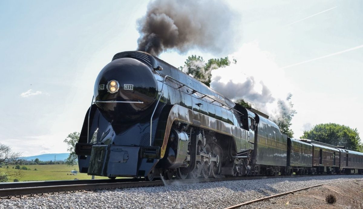 Norfolk and Western Class J 611 steam locomotive running through the Virginia countryside