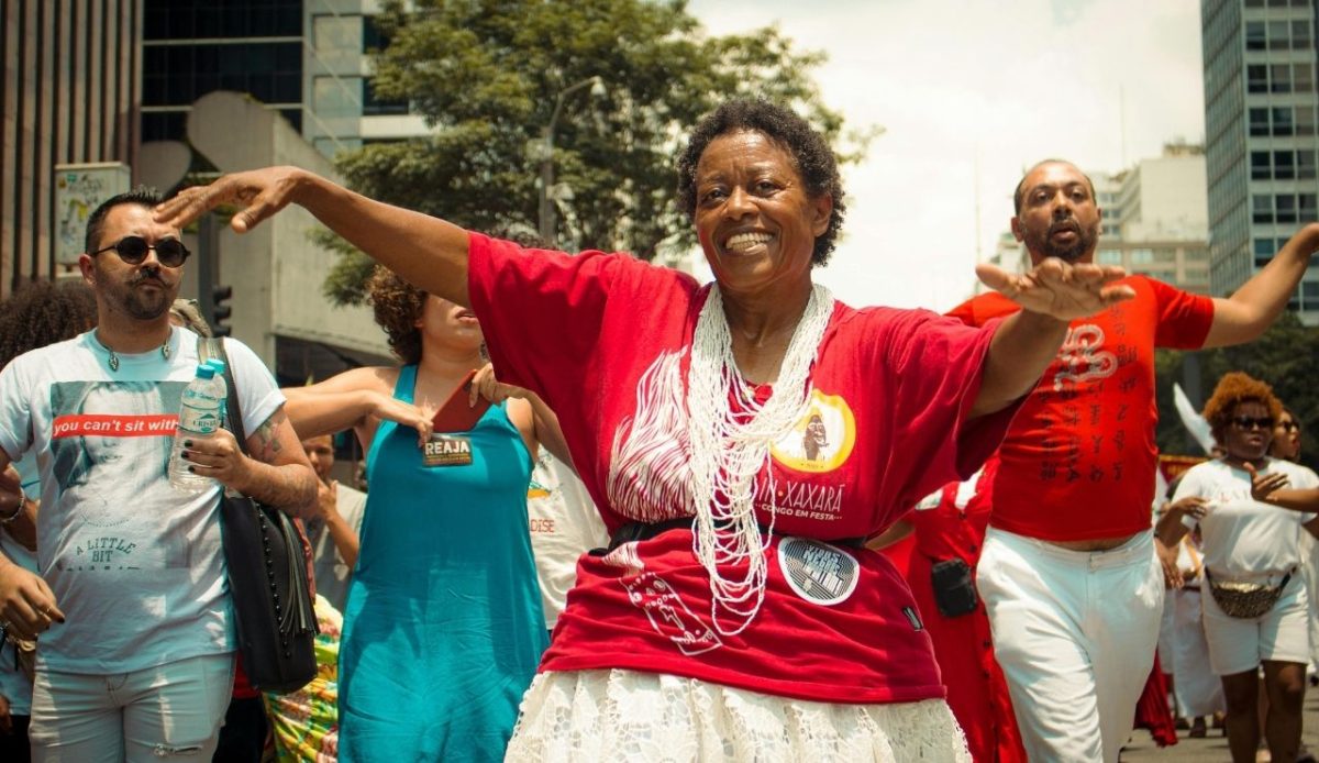 14 Best Airbnb Experiences Around the World Worth Trying 13 People performing samba dance during a lively street parade at Carnival in São Paulo, Brazil