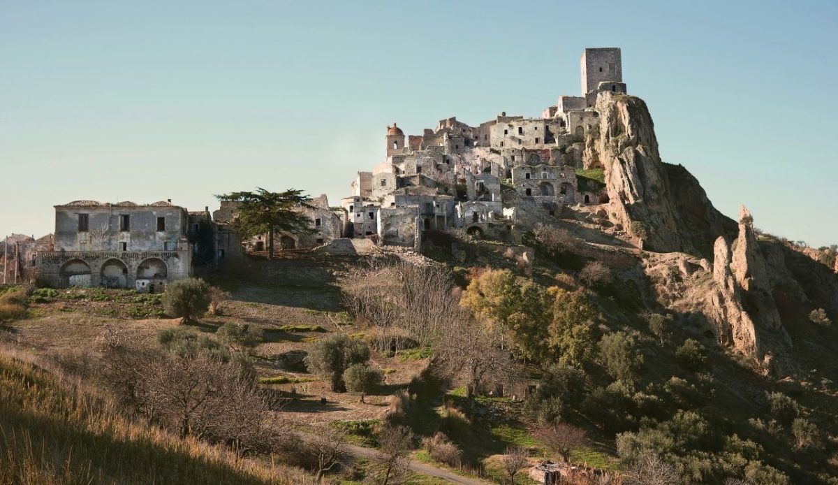 Ruins of Craco ghost town on a hilltop, Italy
