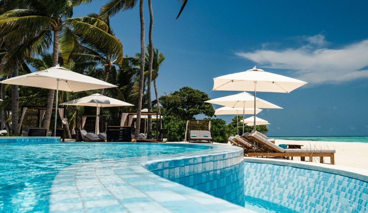 9 Luxury All-Inclusive Resorts To Experience In Barbados 9 White Outdoor Umbrellas Near Swimming Pool