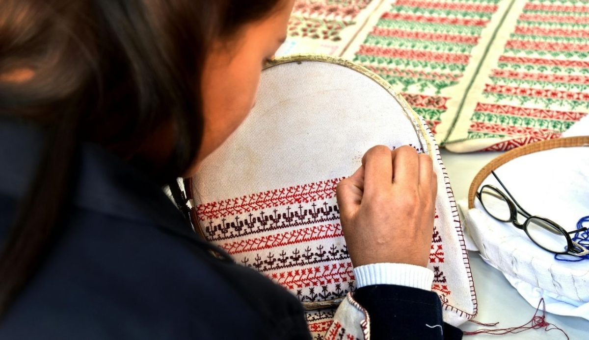14 Best Airbnb Experiences Around the World Worth Trying 10 Woman creating traditional hand embroidery in Tetouan, Morocco