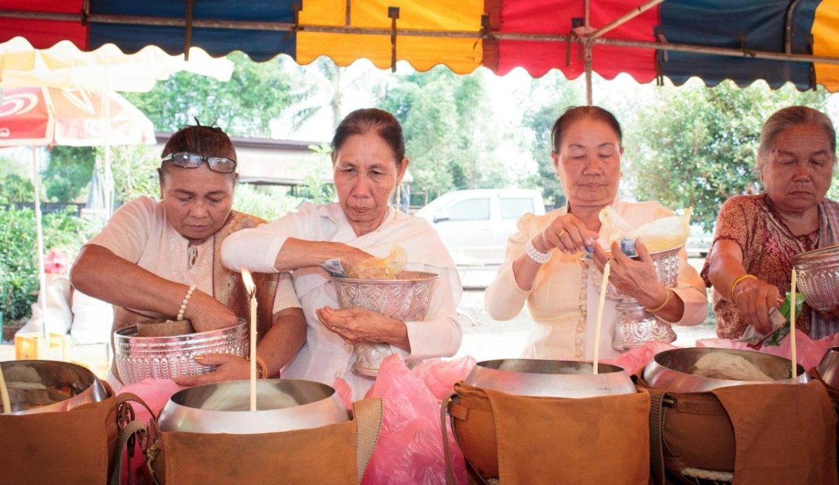 14 Best Airbnb Experiences Around the World Worth Trying 7 Women making food offerings at a Buddhist temple ceremony in Thailand