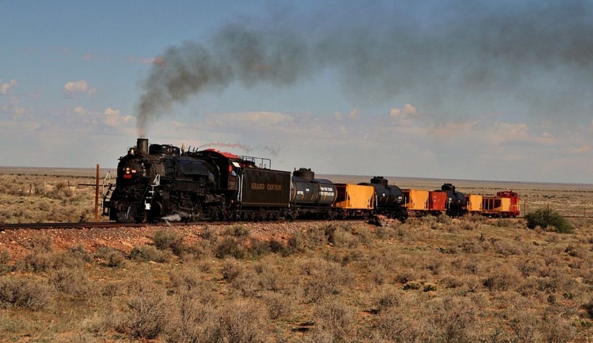 11 Best Stops Between Las Vegas And The Grand Canyon 5 Grand Canyon Railway steam train traveling through the high desert near Williams, Arizona, United States