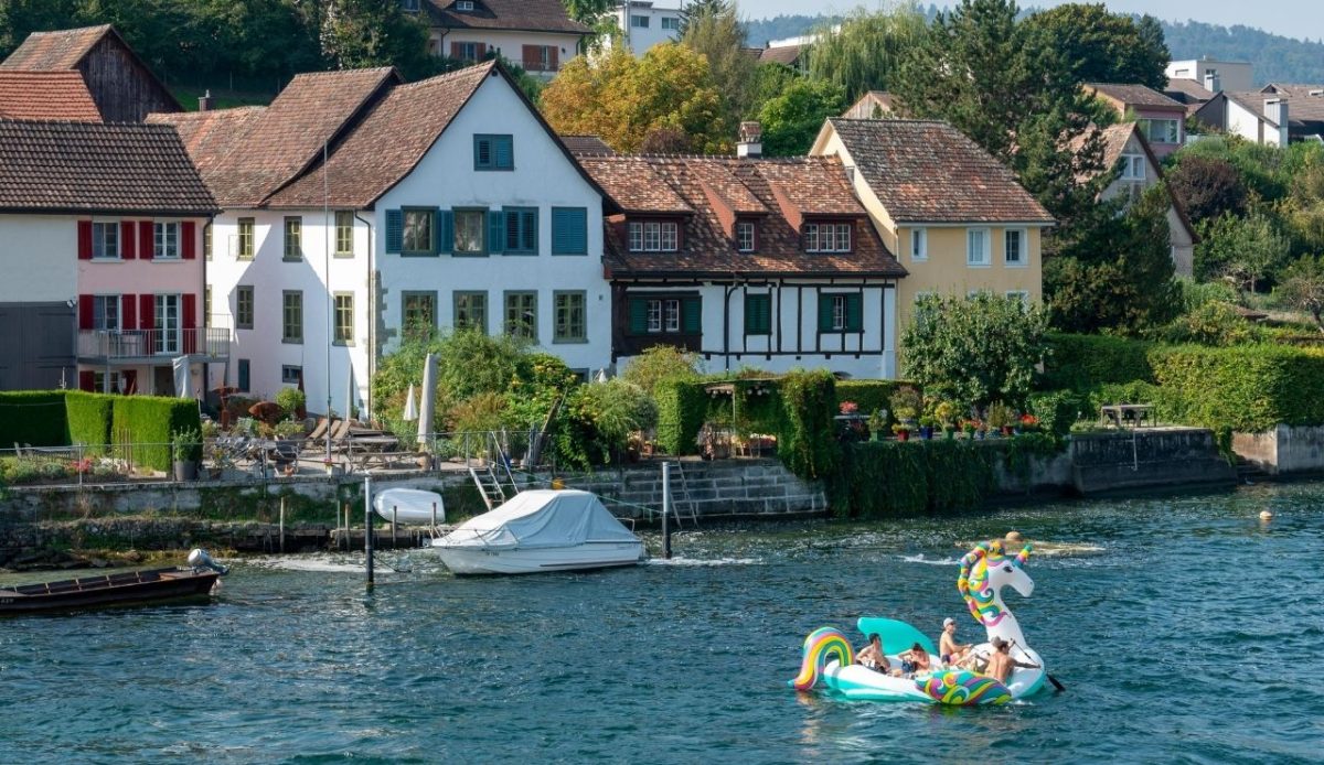 10 Central European Towns So Beautiful They Belong on a Postcard 10 Stein am Rhein, SH, Switzerland Drone Shot of People on a Floater