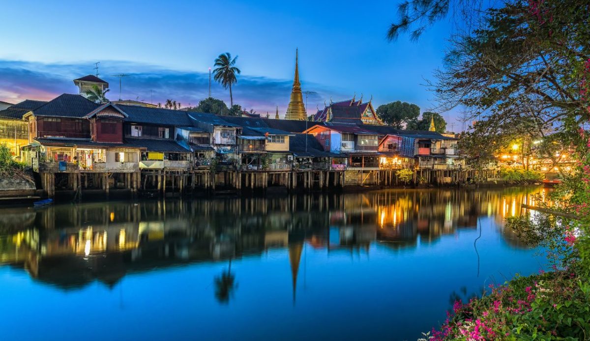 More details Chanthaboon Waterfront Community at dusk     
