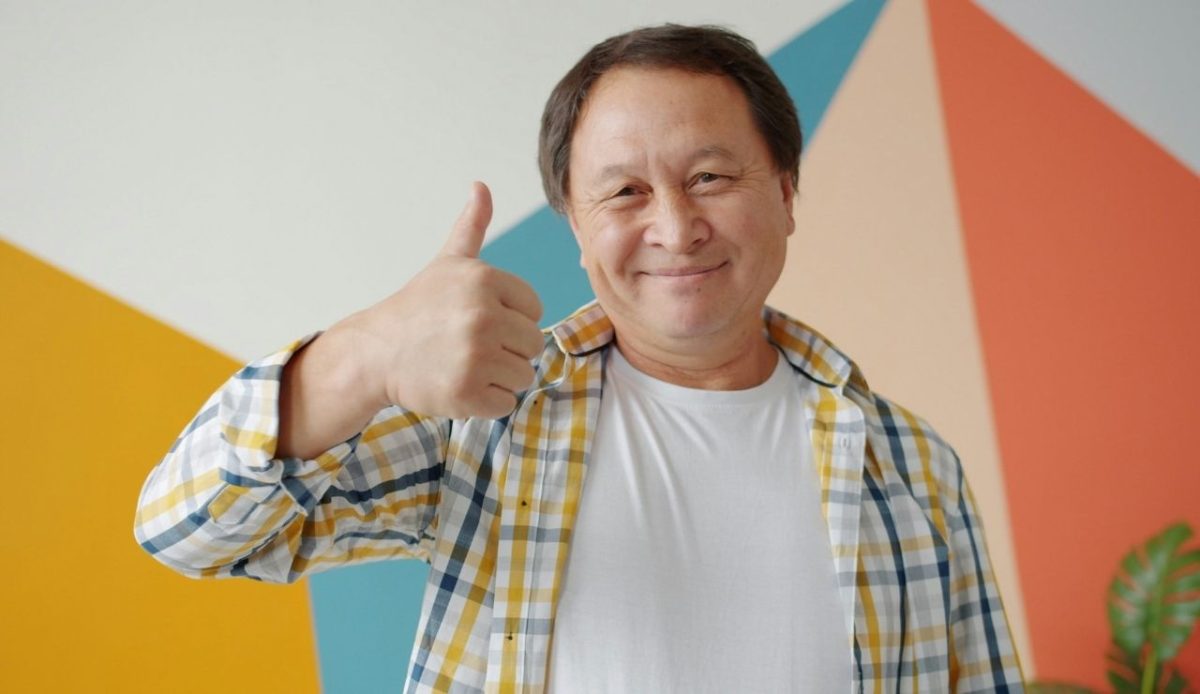 7 Common Phrases Americans Should Skip When Traveling Abroad 2 A man giving an approval gesture