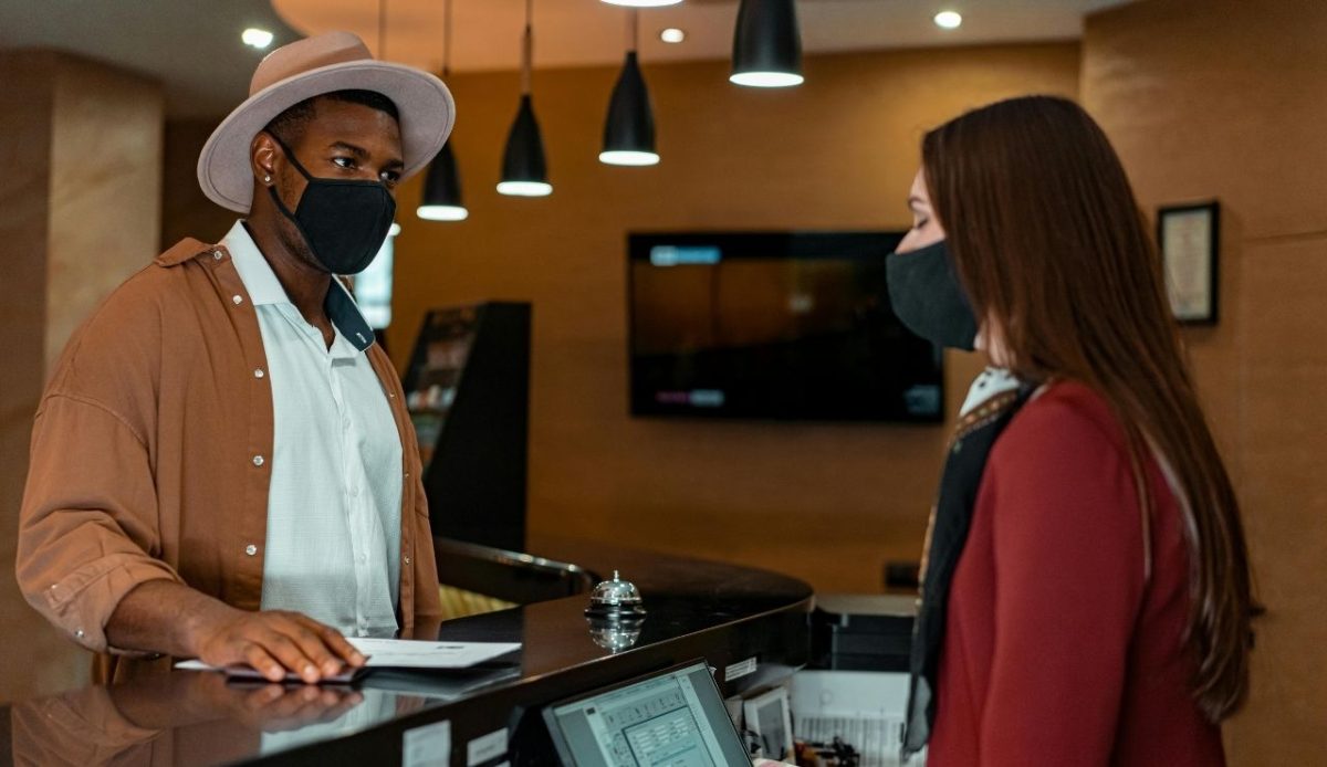 A man reporting to the guest service,    