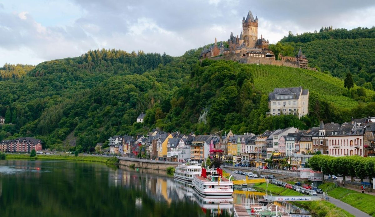 10 Central European Towns So Beautiful They Belong on a Postcard 7 Cochem, RP, Germany Castle on Hill over Village Near Body of Water