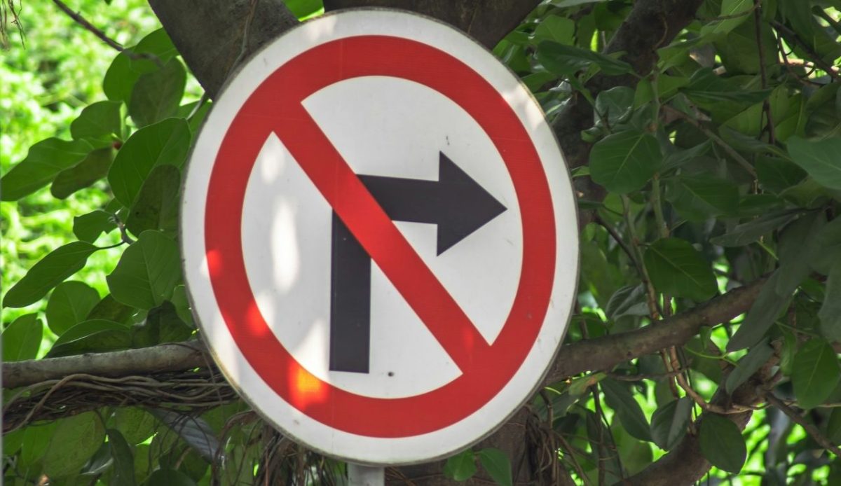 A traffic sign showing do not turn right              