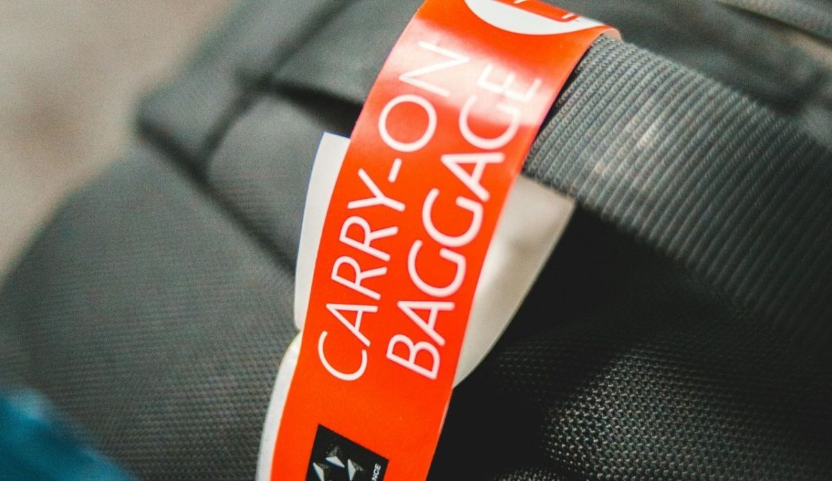 Carry-on Baggage Tag on suitcase (bag)