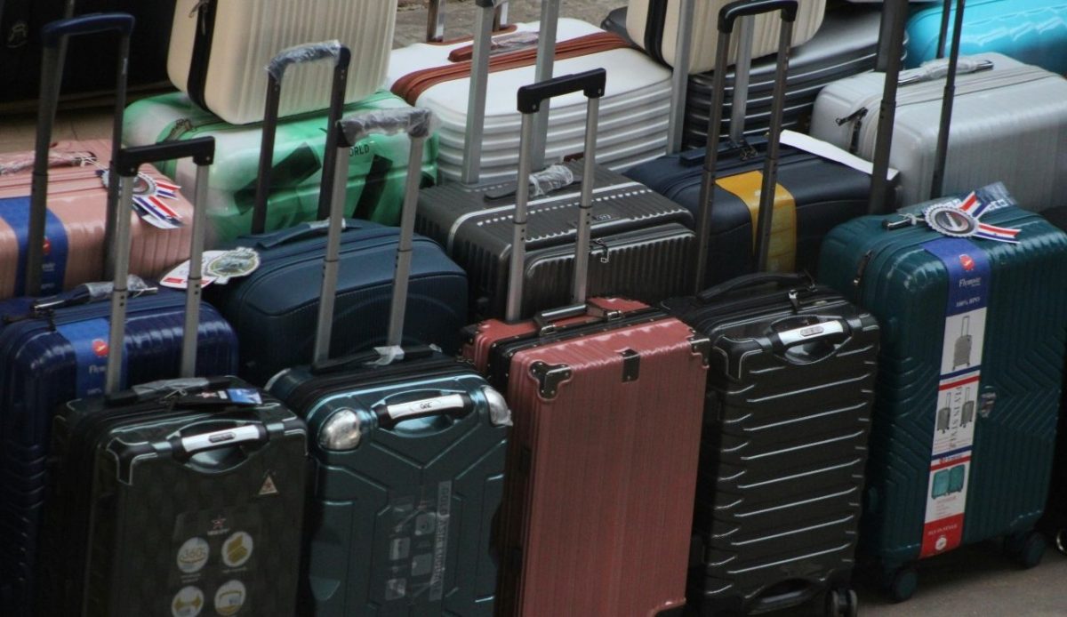 Collection of Modern Suitcases Lined Up          