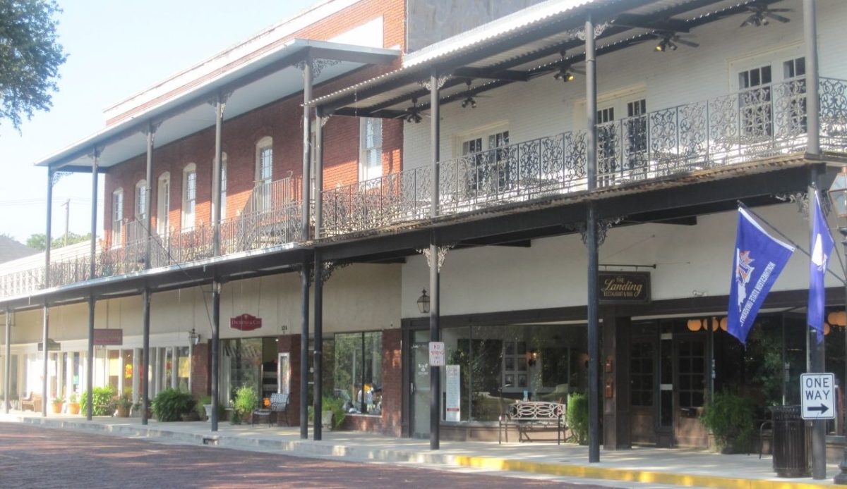 Downtown Natchitoches, with historic buildings, stores, and shops, maintains brick streets, Louisiana, USA               