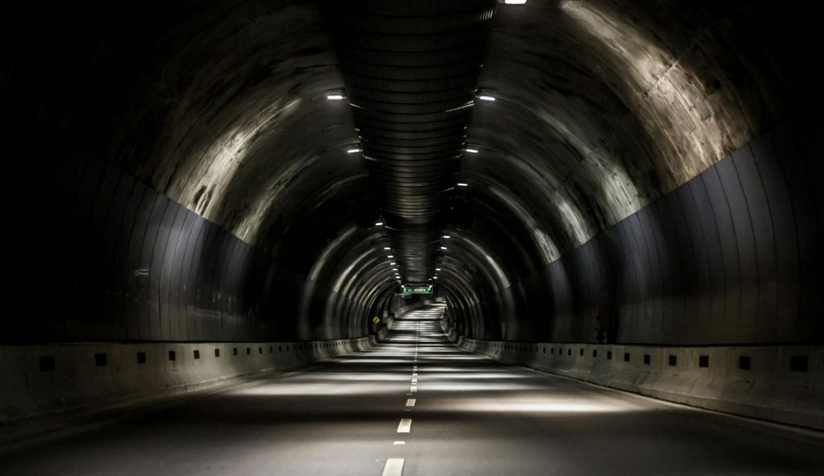 Interior view of a long road tunnel             