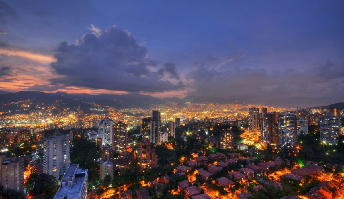 Medellín cityscape at dusk with glowing lights, Colombia   