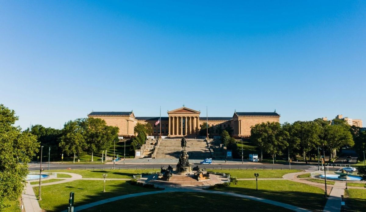 Old Museum of Art near sculptures and lawn in Philadelphia, USA    