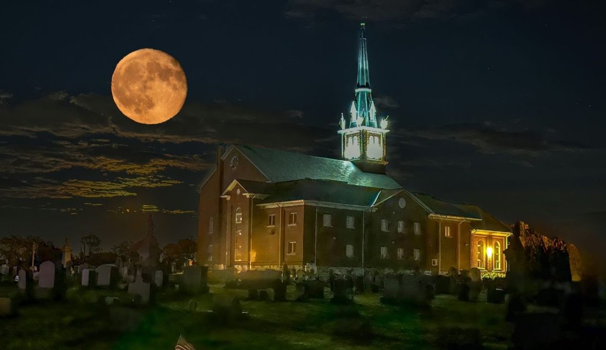 Super Blue Moon over church and graveyard ,Kutztown, Pennsylvania, USA     
