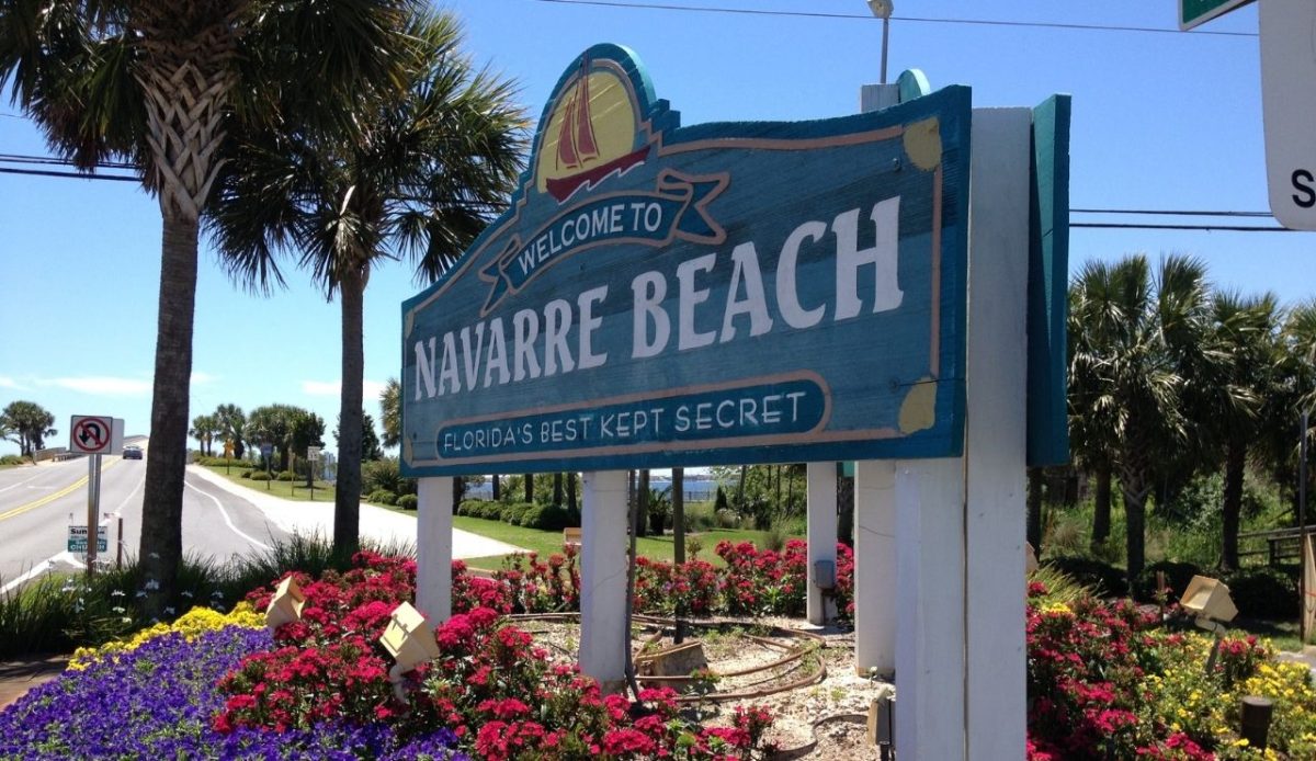 The old Navarre Beach sign in the spring time             